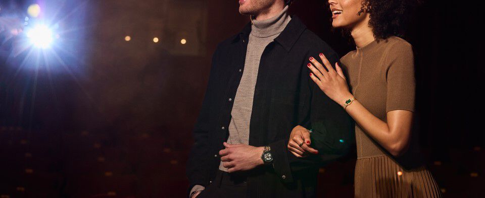 Couple wearing the Goddess of Time watch Model 97L184 and Sutton Watch Model 96A329